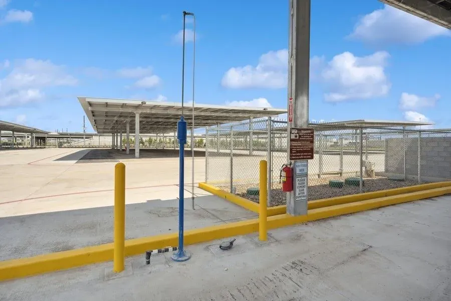 Outdoor covered parking space.