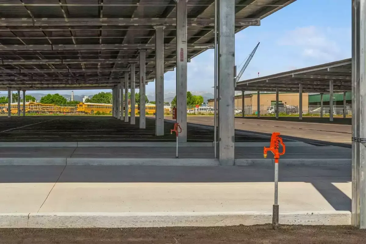 Row of covered parking spaces.