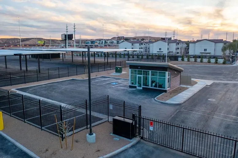 Gated entrance and covered parking spaces.