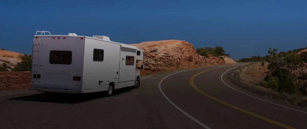 RV traveling down road