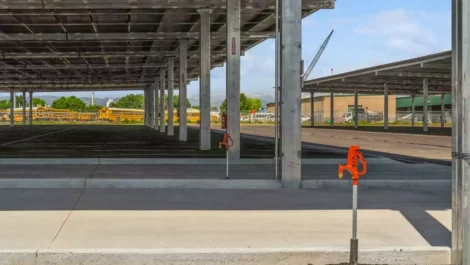 Row of covered parking spaces.