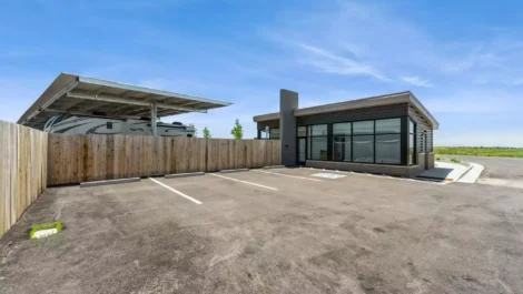 Aurora's Office Building with parking spots.