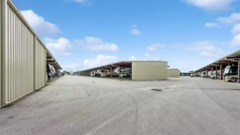 Paved covered parking spaces.