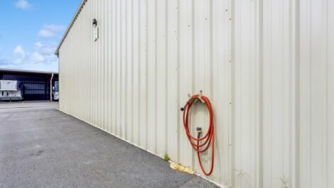 Water hose on side of facility.