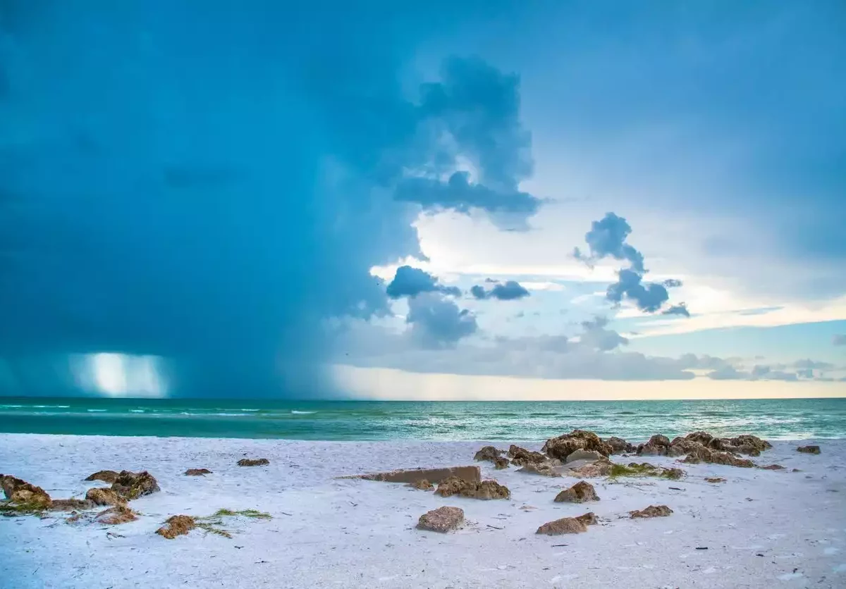 Landscape photo of sky and ocean of Siesta Beach in Siesta Key, Florida.