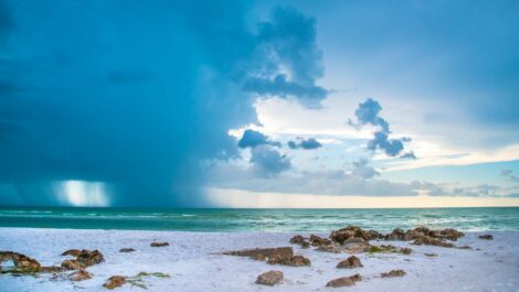 Landscape photo of sky and ocean of Siesta Beach in Siesta Key, Florida.