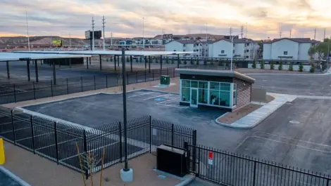 Gated entrance and covered parking spaces.