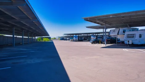 Honey Bee RV in Peoria parking with awning