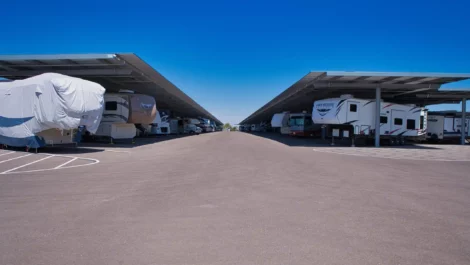 Honey Bee RV in Peoria parking with awning